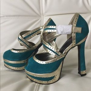 Teal platform heels with gold trim by T.U.K.